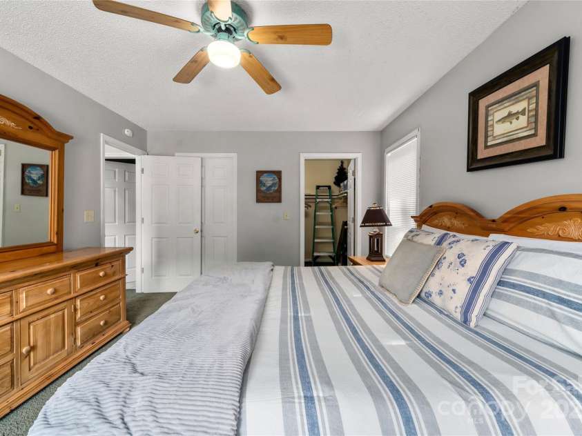84 Indian Trace, Maggie Valley, NC 28751.  MLS# CAR4272235, YatesRealty ID 21289. Main bedroom has access to the bath