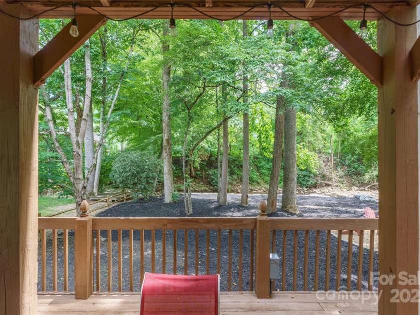 84 Indian Trace, Maggie Valley, NC 28751.  MLS# CAR4272235, YatesRealty ID 21289. View of the creek