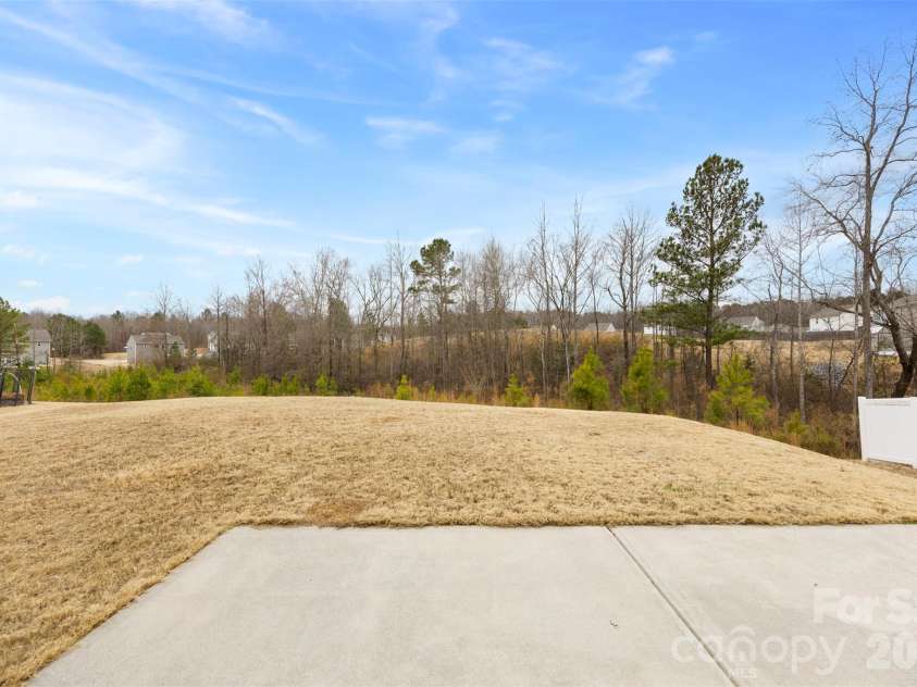 717 Lexington Drive, Albemarle, NC 28001.  MLS# CAR4345706, YatesRealty ID 21291. Backyard Views 