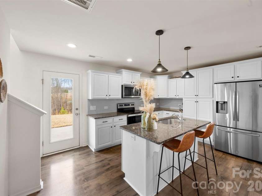 717 Lexington Drive, Albemarle, NC 28001.  MLS# CAR4345706, YatesRealty ID 21291. Can view the back yard while in the kitchen! 