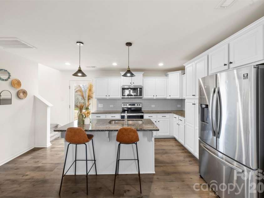 717 Lexington Drive, Albemarle, NC 28001.  MLS# CAR4345706, YatesRealty ID 21291. Kitchen island 