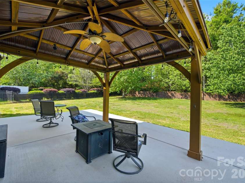 2429 Glyncastle Way, Gastonia, NC 28056.  MLS# CAR4374292, YatesRealty ID 21302. Charming pergola on extended patio
