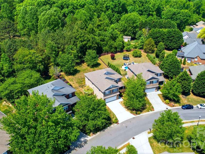 2429 Glyncastle Way, Gastonia, NC 28056.  MLS# CAR4374292, YatesRealty ID 21302. Private Treed Yard