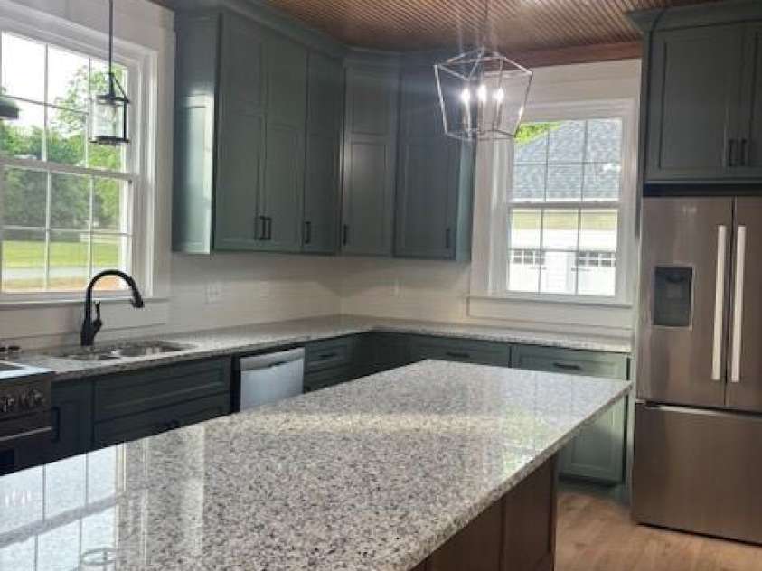 201 First Street, Lowell, NC 28098.  MLS# CAR4379985, YatesRealty ID 21304. 2nd  view of kitchen