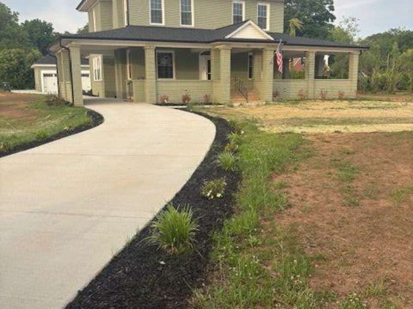 201 First Street, Lowell, NC 28098.  MLS# CAR4379985, YatesRealty ID 21304. Front of House