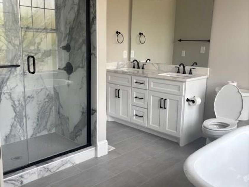 201 First Street, Lowell, NC 28098.  MLS# CAR4379985, YatesRealty ID 21304. Master Bathroom