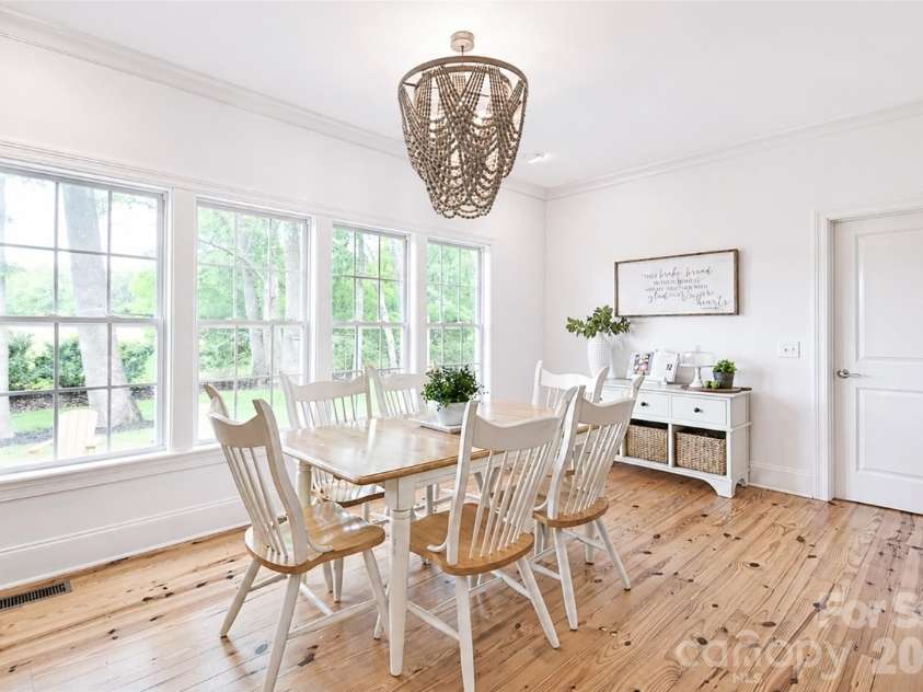 4484 Ranchway Drive, Concord, NC 28027.  MLS# CAR4375185, YatesRealty ID 21305. Bright dining space with expansive windows overlooking the backyard