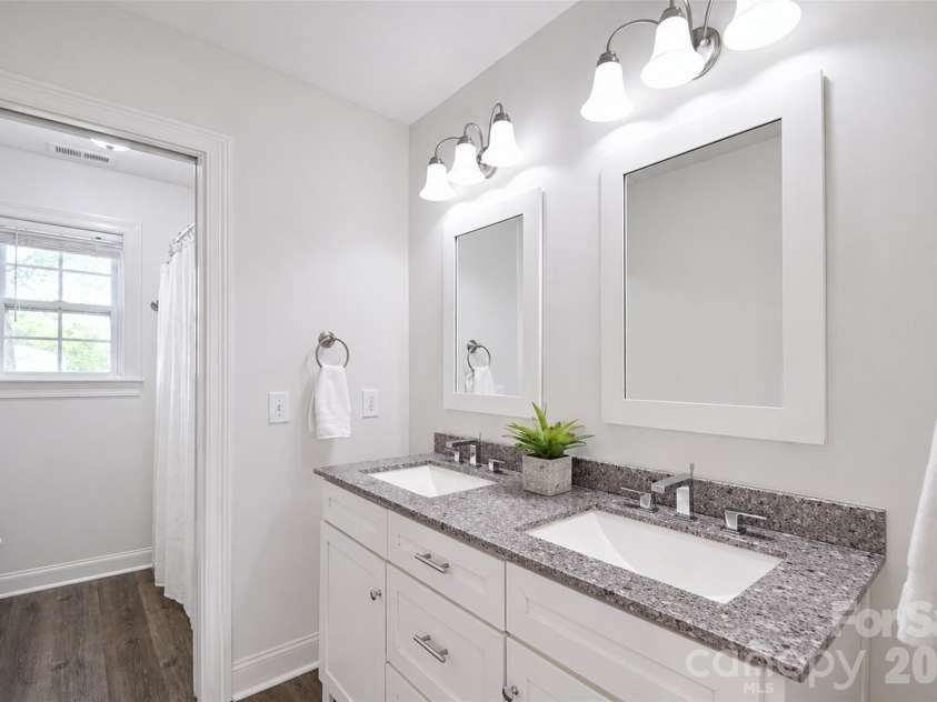 4484 Ranchway Drive, Concord, NC 28027.  MLS# CAR4375185, YatesRealty ID 21305. Bright full bath with double vanity and generous storage
