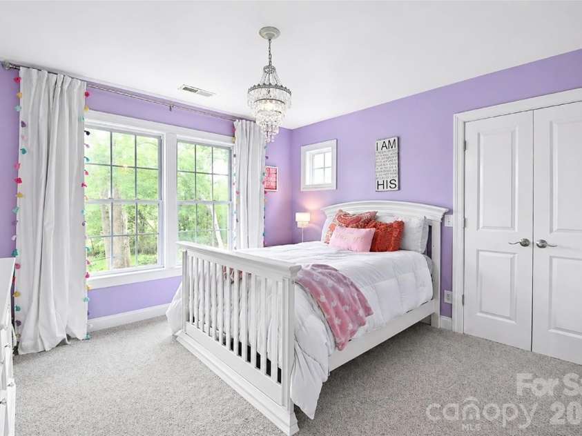 4484 Ranchway Drive, Concord, NC 28027.  MLS# CAR4375185, YatesRealty ID 21305. Charming secondary bedroom with large windows and abundant natural light