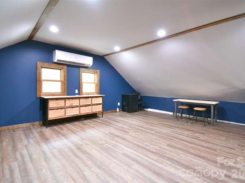 4484 Ranchway Drive, Concord, NC 28027.  MLS# CAR4375185, YatesRealty ID 21305. Finished upper level offering a spacious bonus workshop or studio with mini-split system for year-round comfort