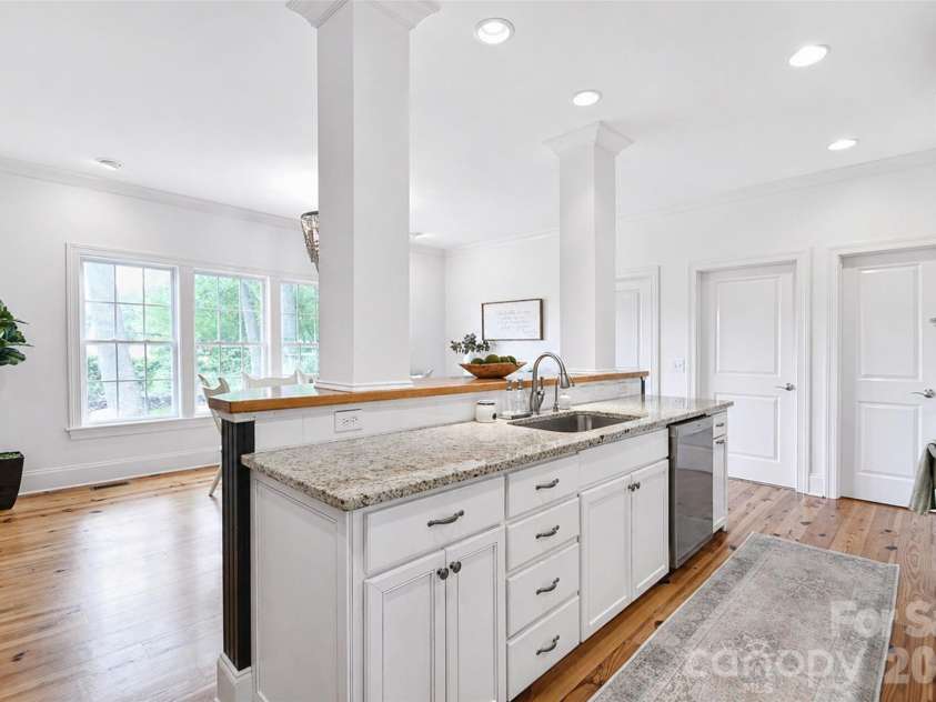 4484 Ranchway Drive, Concord, NC 28027.  MLS# CAR4375185, YatesRealty ID 21305. Open-concept kitchen with large prep space and seamless flow to dining area