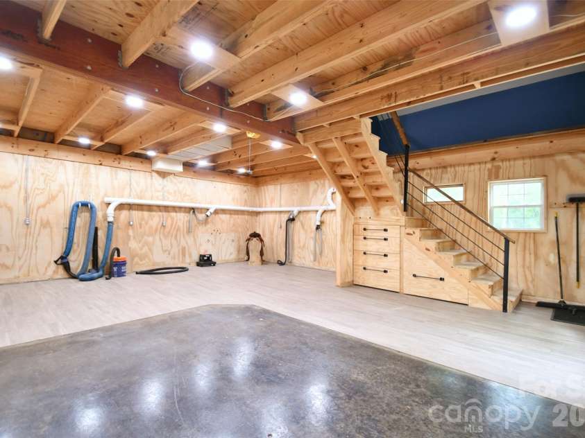 4484 Ranchway Drive, Concord, NC 28027.  MLS# CAR4375185, YatesRealty ID 21305. Open-concept workshop layout with high ceilings and flexible work zones designed for efficiency and creativity
