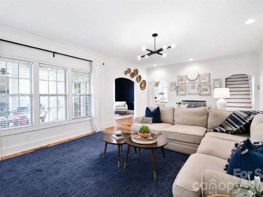 4484 Ranchway Drive, Concord, NC 28027.  MLS# CAR4375185, YatesRealty ID 21305. Spacious living area with large windows and flexible seating layout