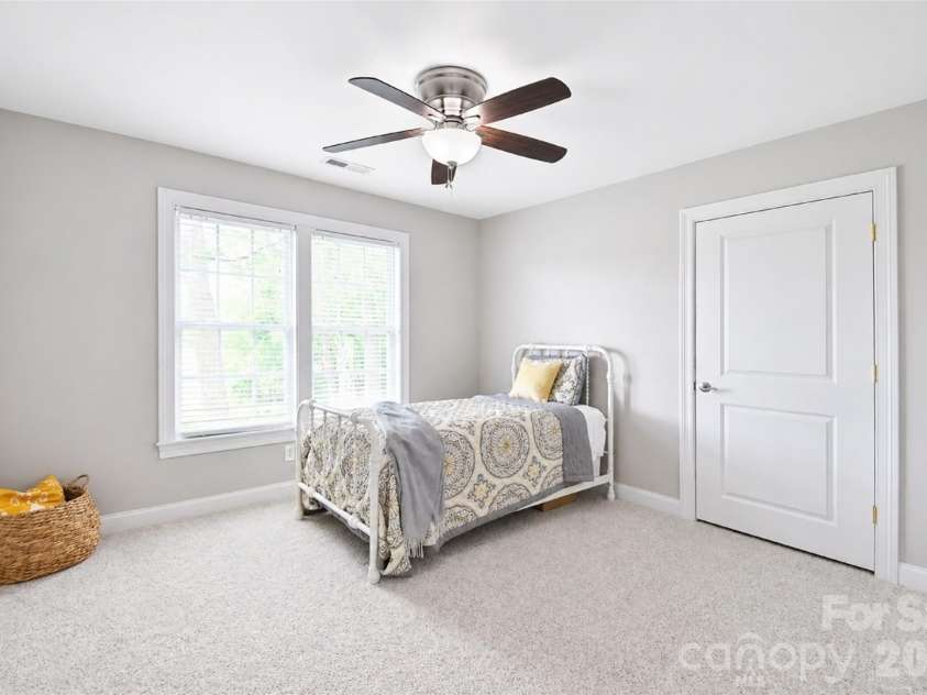 4484 Ranchway Drive, Concord, NC 28027.  MLS# CAR4375185, YatesRealty ID 21305. Spacious secondary bedroom with soft natural light and versatile layout