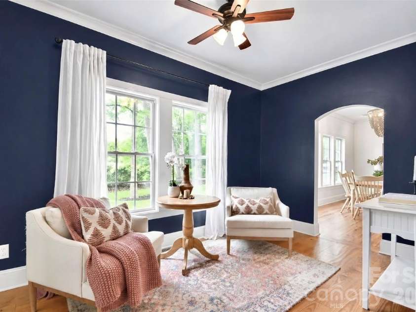 4484 Ranchway Drive, Concord, NC 28027.  MLS# CAR4375185, YatesRealty ID 21305. Stylish flex space with bold accent wall, natural light, and cozy seating
