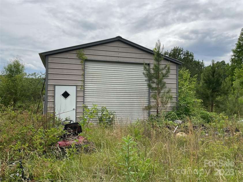 4282 Mount Gilead Church Road, Connelly Springs, NC 28612.  MLS# CAR4272301, YatesRealty ID 21308. Metal storage shed