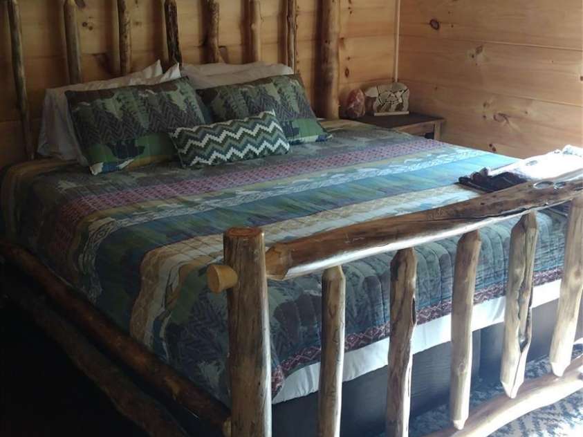 962 Laurel Mountain View Road, Flat Rock, NC 28731.  MLS# CAR4270563, YatesRealty ID 21311. Bedroom w/ King bed