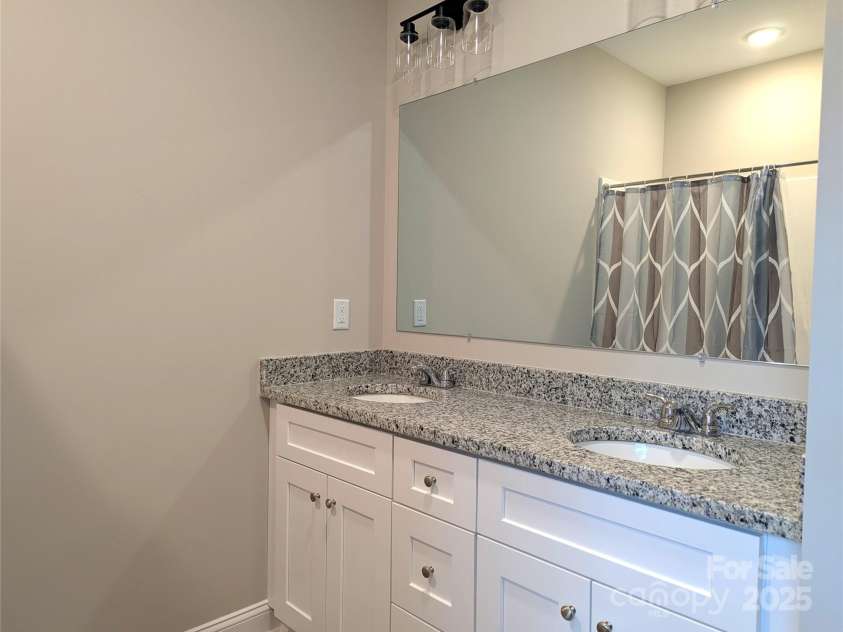 203 Hill Avenue, Albemarle, NC 28001.  MLS# CAR4224625, YatesRealty ID 21312. Owner Suite