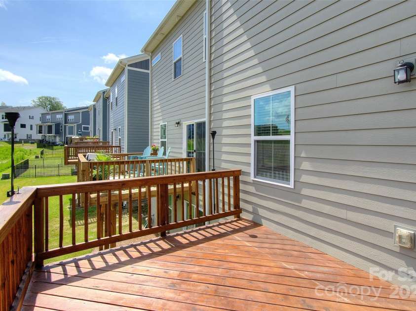 411 Lahinch Drive, Tega Cay, SC 29708.  MLS# CAR4273296, YatesRealty ID 21314. Deck