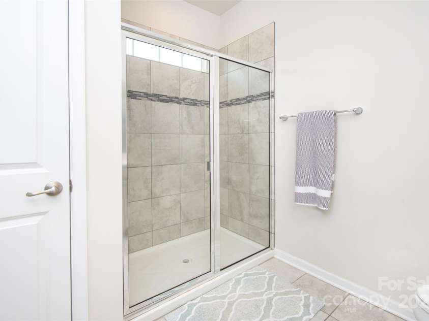 411 Lahinch Drive, Tega Cay, SC 29708.  MLS# CAR4273296, YatesRealty ID 21314. Primary Bathroom