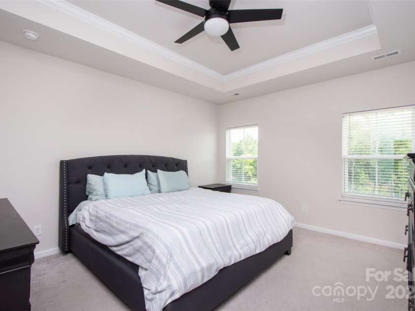 411 Lahinch Drive, Tega Cay, SC 29708.  MLS# CAR4273296, YatesRealty ID 21314. Primary Bedroom