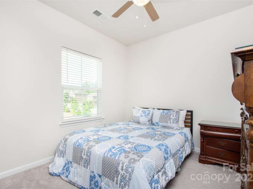 411 Lahinch Drive, Tega Cay, SC 29708.  MLS# CAR4273296, YatesRealty ID 21314. Secondary Bedroom