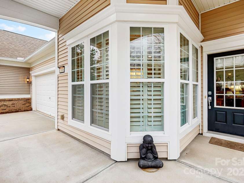2036 Hudson Lane, Fort Mill, SC 29707.  MLS# CAR4225356, YatesRealty ID 21316. Rocking chair front porch