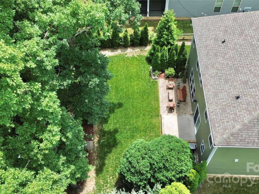 7011 Hyde Park Drive, Indian Trail, NC 28079.  MLS# CAR4268661, YatesRealty ID 21323. Aerial view of private rear yard and wooded back yard space