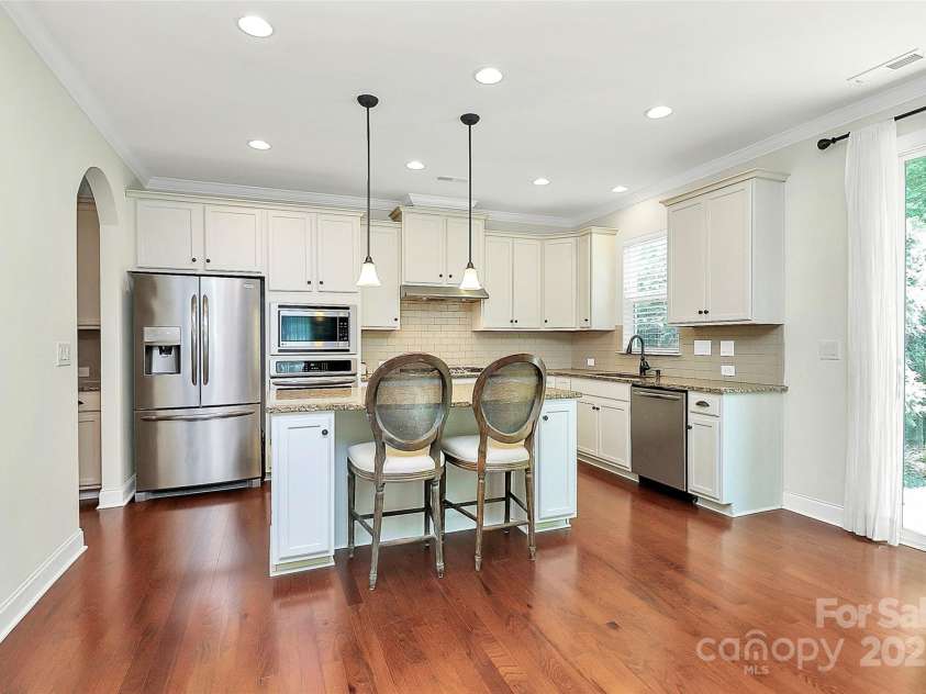 7011 Hyde Park Drive, Indian Trail, NC 28079.  MLS# CAR4268661, YatesRealty ID 21323. Island kitchen is ideal for food prep