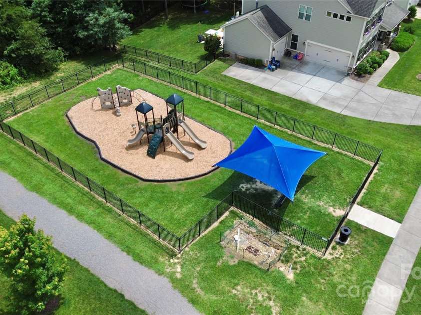 7011 Hyde Park Drive, Indian Trail, NC 28079.  MLS# CAR4268661, YatesRealty ID 21323. Playground a short walk from home on the same street