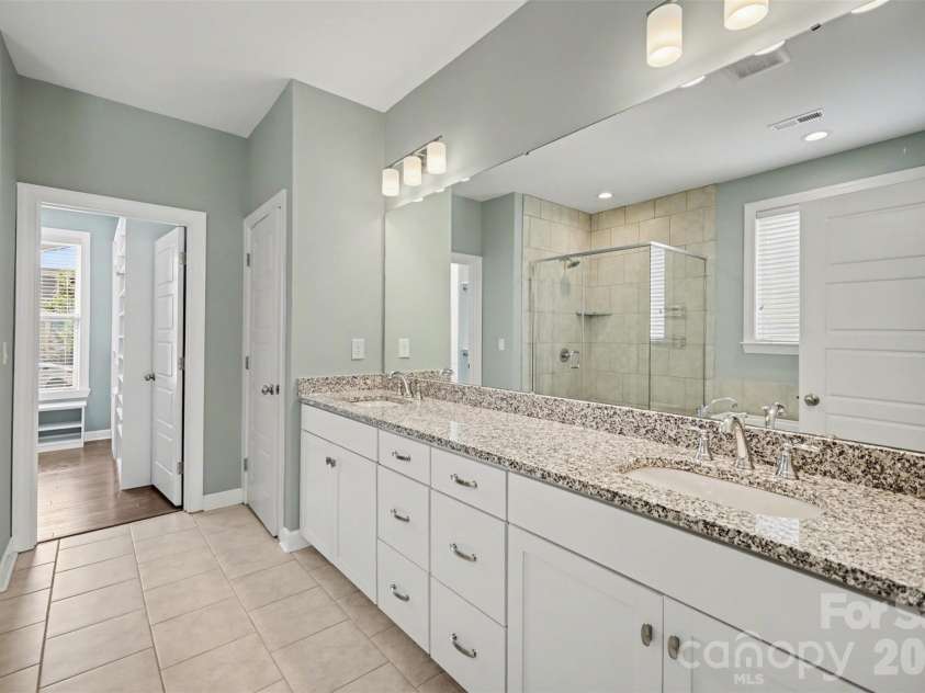 115 Boxelder Road, Clover, SC 29710.  MLS# CAR4364422, YatesRealty ID 21324. Owners bathroom with extended vanity and great storage space, tile flooring, private water closet 