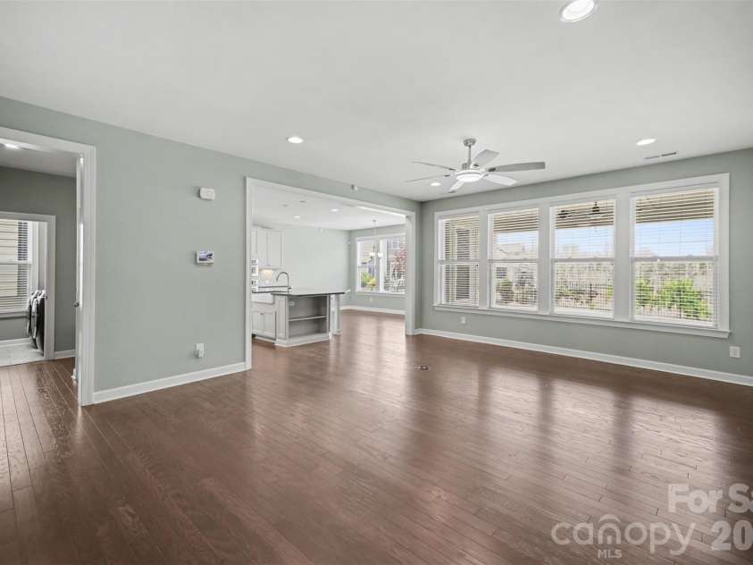 115 Boxelder Road, Clover, SC 29710.  MLS# CAR4364422, YatesRealty ID 21324. The family room is open to the kitchen/large eat in dining area.  Tons of windows make this space open and airy with great natural light