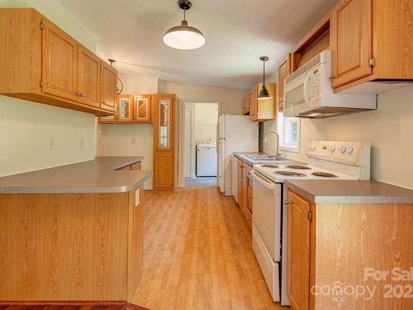 27 Jackson Cove Road, Leicester, NC 28748.  MLS# CAR4266959, YatesRealty ID 21326. 