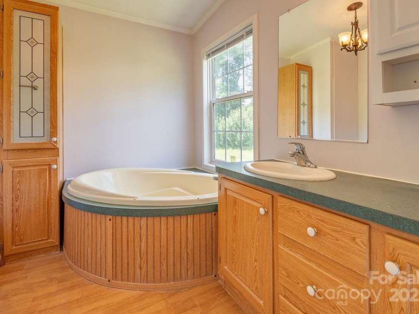 27 Jackson Cove Road, Leicester, NC 28748.  MLS# CAR4266959, YatesRealty ID 21326. 