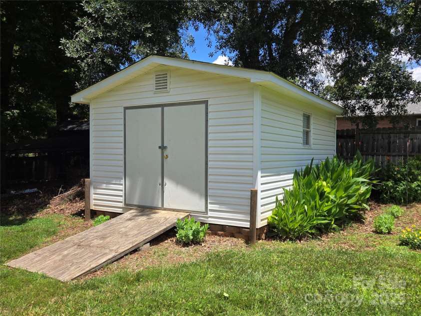 5238 Bethel Church Road, Hickory, NC 28602.  MLS# CAR4272218, YatesRealty ID 21333. Wired Storage Shed