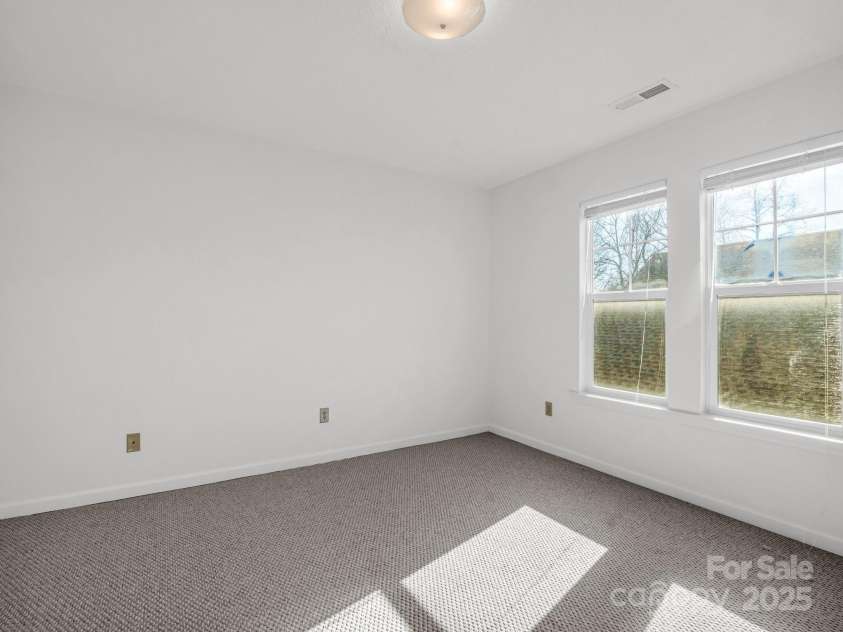 24 Gray Wolf Lane, Hendersonville, NC 28792.  MLS# CAR4208777, YatesRealty ID 2134. Upstairs Bedroom