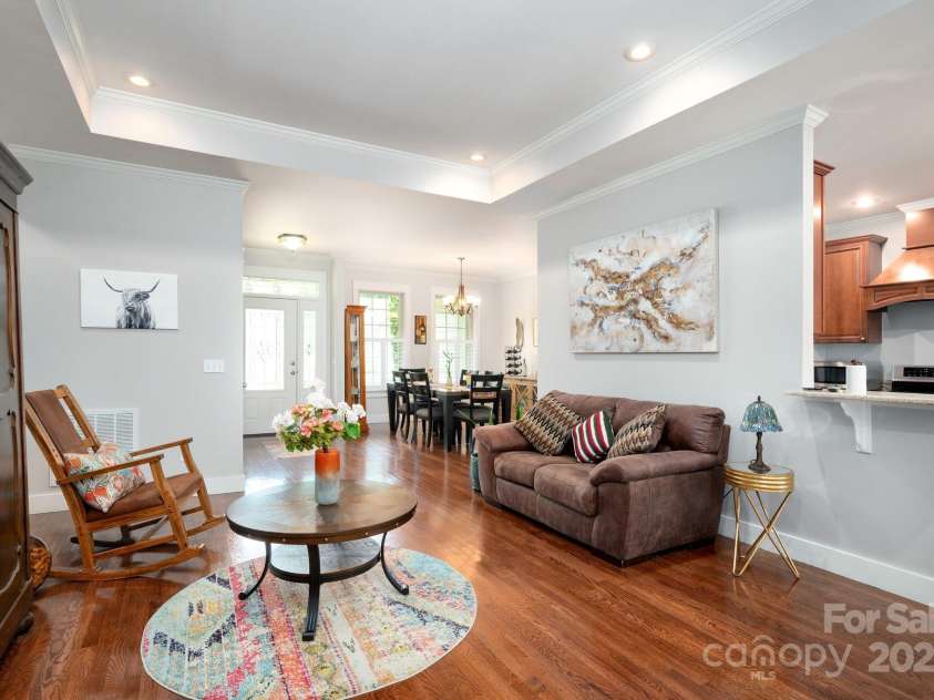 59 Ledgestone Drive, Fairview, NC 28730.  MLS# CAR4272248, YatesRealty ID 21340. Warm wood floors, 9' ceilings with tray accents