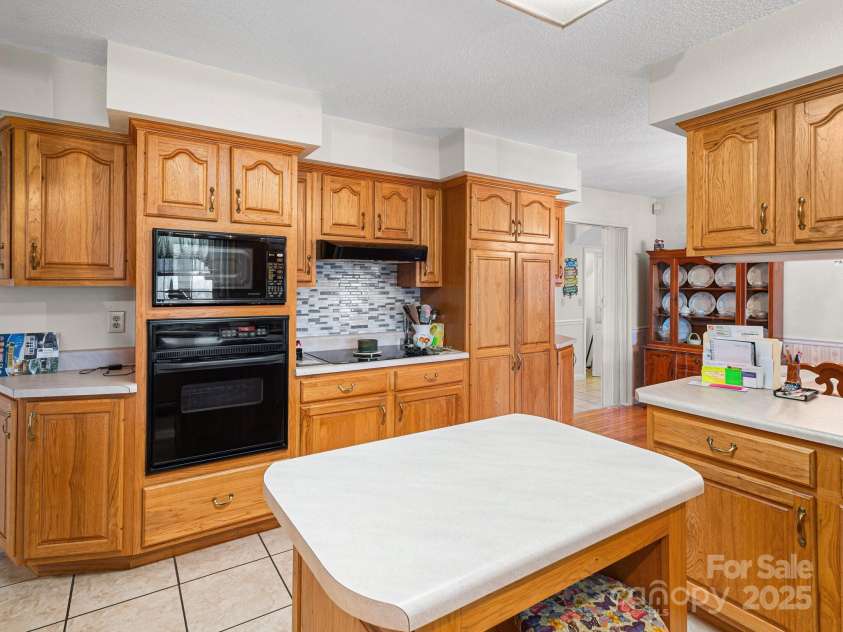 727 Jenkins Valley Road, Alexander, NC 28701.  MLS# CAR4235182, YatesRealty ID 21342. Another view of kitchen