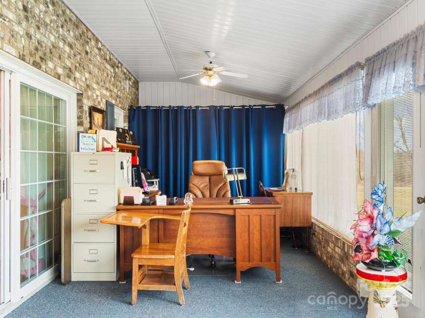 727 Jenkins Valley Road, Alexander, NC 28701.  MLS# CAR4235182, YatesRealty ID 21342. Another view of the sunroom