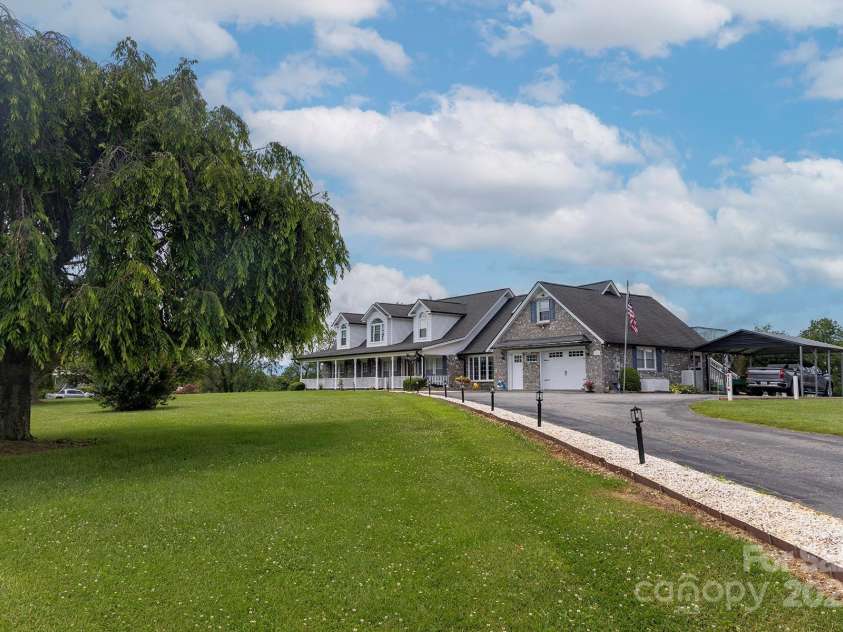 727 Jenkins Valley Road, Alexander, NC 28701.  MLS# CAR4235182, YatesRealty ID 21342. Pleasant driveway up to home!