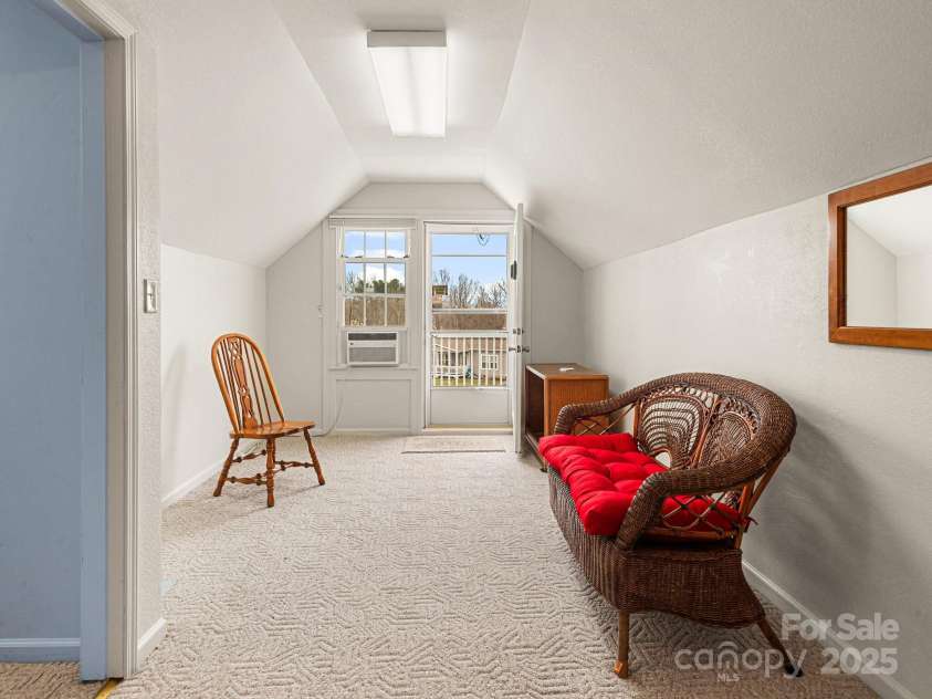 727 Jenkins Valley Road, Alexander, NC 28701.  MLS# CAR4235182, YatesRealty ID 21342. Upstairs dining area adjoining kitchen