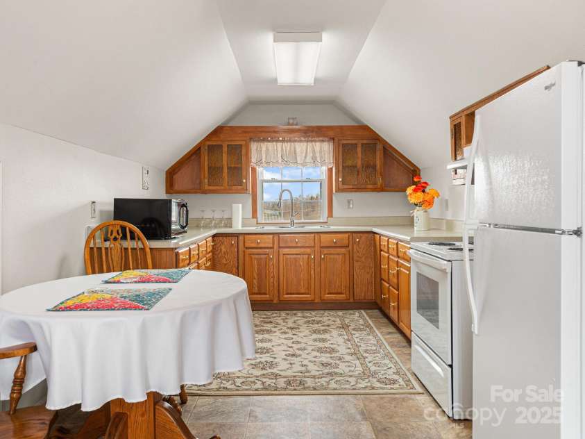 727 Jenkins Valley Road, Alexander, NC 28701.  MLS# CAR4235182, YatesRealty ID 21342. Upstairs kitchen