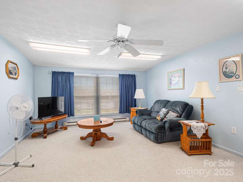 727 Jenkins Valley Road, Alexander, NC 28701.  MLS# CAR4235182, YatesRealty ID 21342. Upstairs sitting room