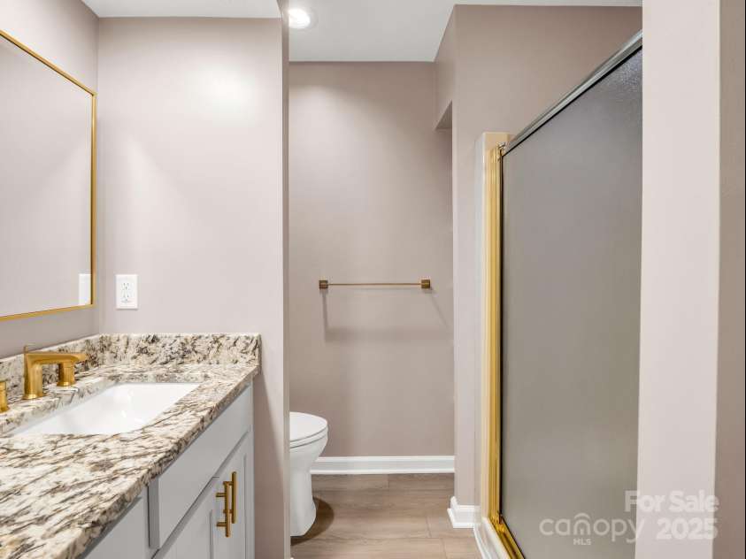 919 Kanuga Road, Hendersonville, NC 28739.  MLS# CAR4243134, YatesRealty ID 21346. Primary ensuite bathroom.