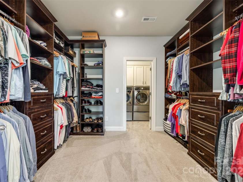 4220 Thames Circle, Fort Mill, SC 29715.  MLS# CAR4269866, YatesRealty ID 21352. Large, custom closet with walk-through to the laundry.