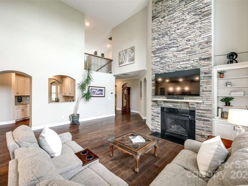 4220 Thames Circle, Fort Mill, SC 29715.  MLS# CAR4269866, YatesRealty ID 21352. The gorgeous floor-to-ceiling fireplace is a show-stopper.