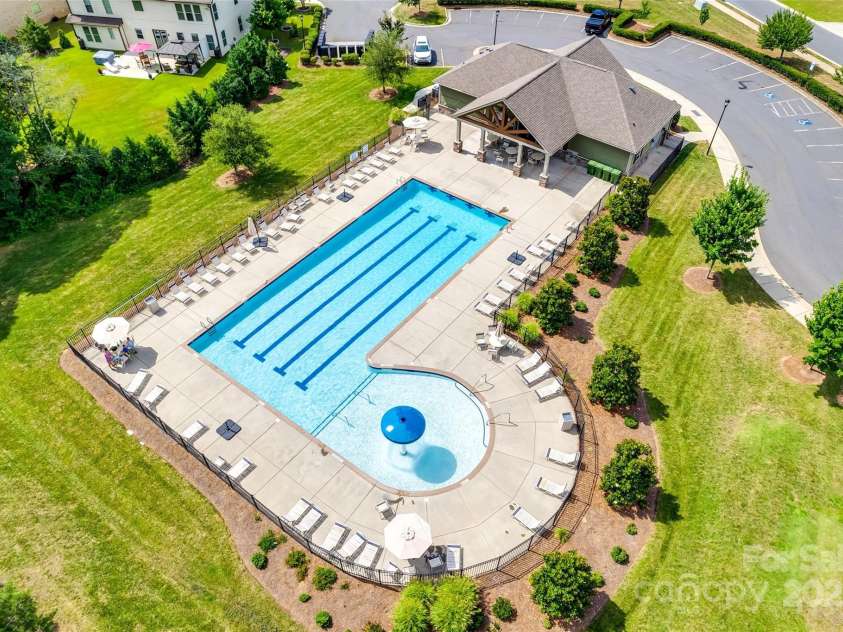 4220 Thames Circle, Fort Mill, SC 29715.  MLS# CAR4269866, YatesRealty ID 21352. The pool is perfect for sunny Carolina days!