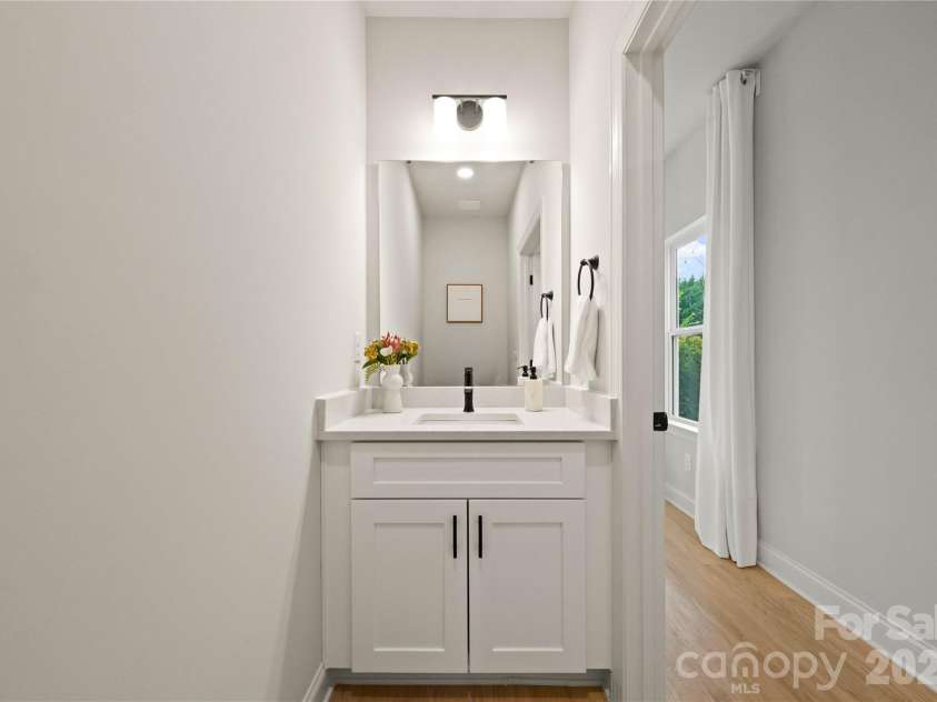 9131 Old Moores Chapel Road, Charlotte, NC 28214.  MLS# CAR4381177, YatesRealty ID 21353. Half bath on main