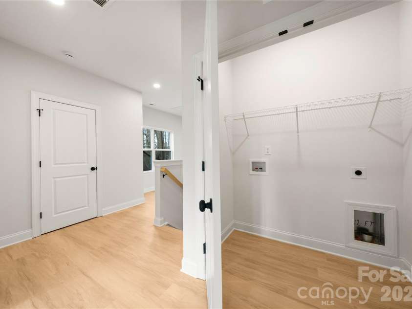 9131 Old Moores Chapel Road, Charlotte, NC 28214.  MLS# CAR4381177, YatesRealty ID 21353. Primary on upper hallway