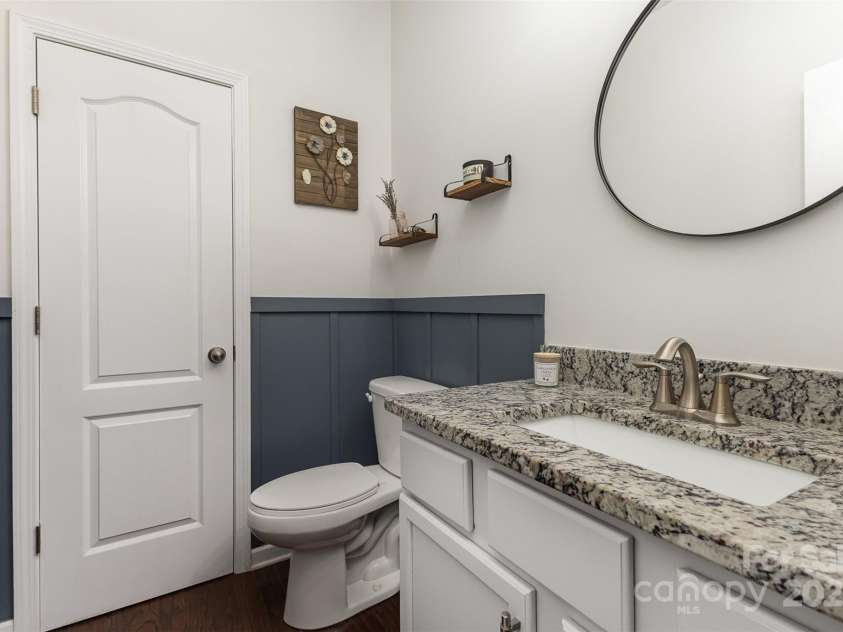 6007 Eleanor Rigby Road, Charlotte, NC 28278.  MLS# CAR4268118, YatesRealty ID 21354. Main level powder room with linen closet